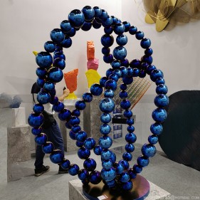 Highly polished welded metal colored sphere combined sculpture  Highly polished welded metal colored sphere combined sculpture