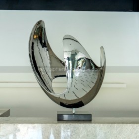 Mirror polished abstract stainless steel sculpture Mirror polished abstract stainless steel sculpture