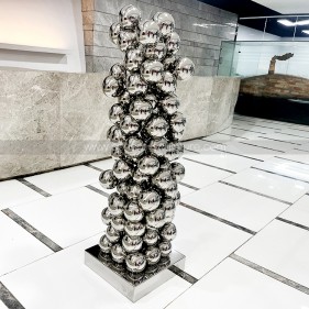 Mirror polished stainless steel combined sphere sculpture  Mirror polished stainless steel combined sphere sculpture