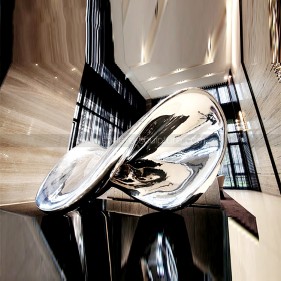 Large mirror polished stainless steel sculpture Large mirror polished stainless steel sculpture