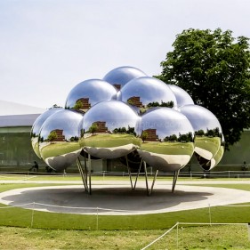 Public art installation large mirrored stainless steel sphere sculpture Public art installation large mirrored stainless steel sphere sculpture