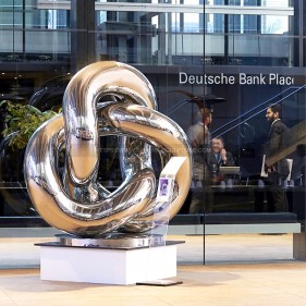 Entrusted sculpture, mirror polished stainless steel sculpture Entrusted sculpture, mirror polished stainless steel sculpture