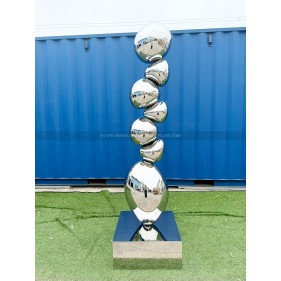 Mirror polished stainless steel rock sculpture Mirror polished stainless steel rock sculpture