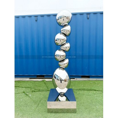 Mirror polished stainless steel rock sculpture