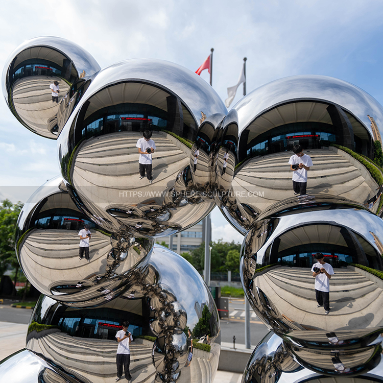 Stainless steel polished metal sphere sculpture