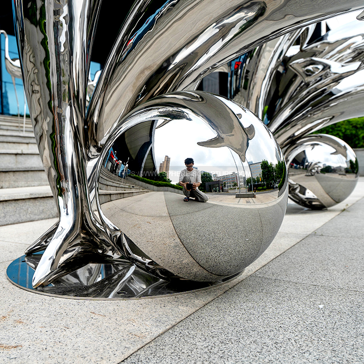 Stainless steel dolphin sculpture