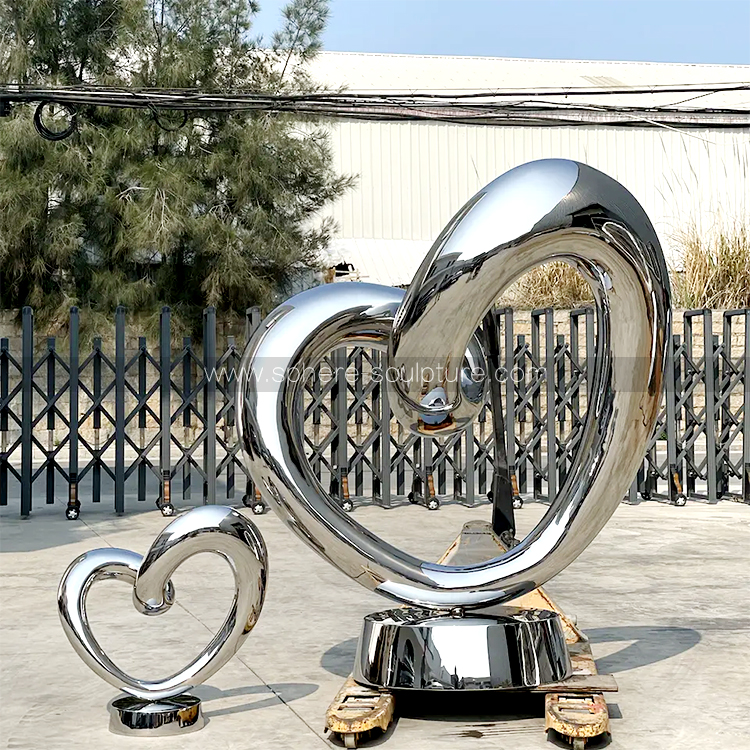 Mirror polished stainless steel heart sculpture