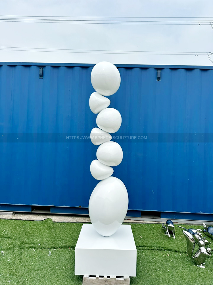 Mirror polished stainless steel rock sculpture